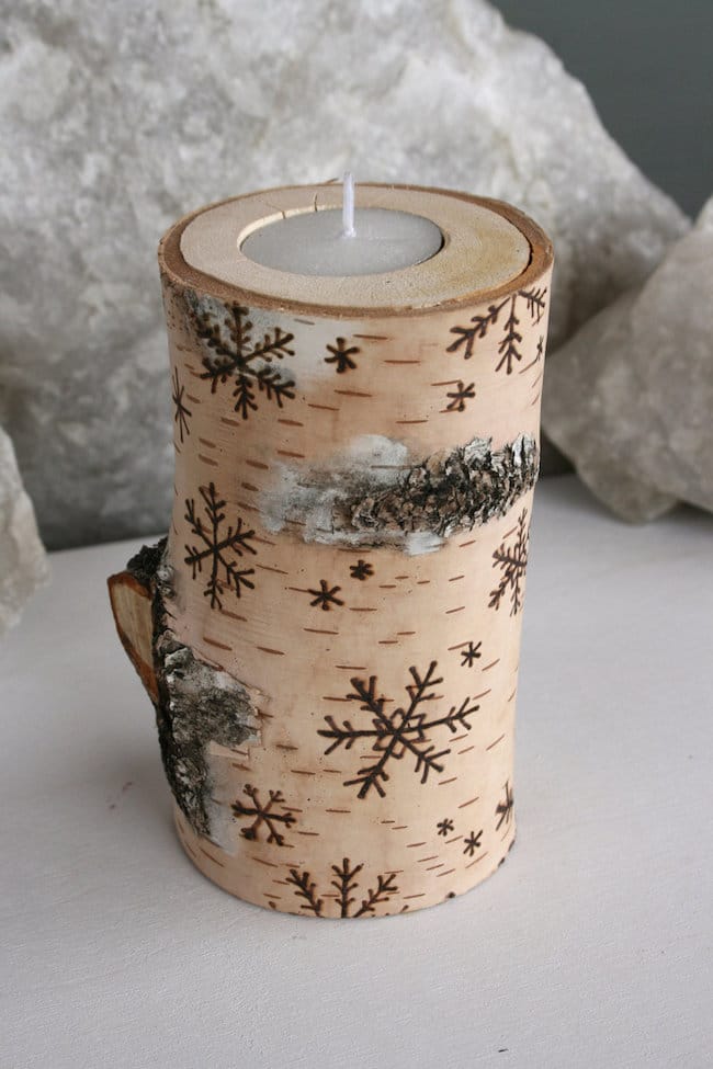Birch wood candle holder with snowflake designs