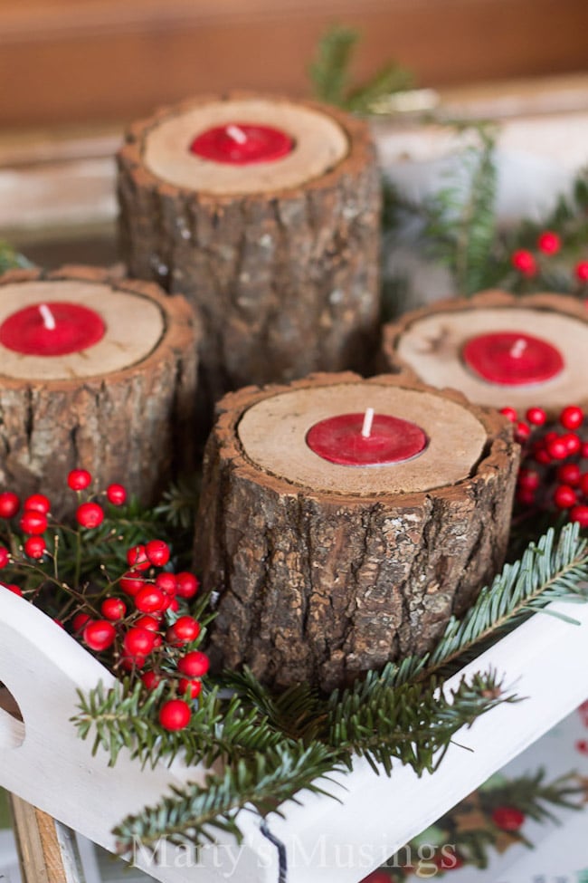 Rustic wood candle holders with red tea lights