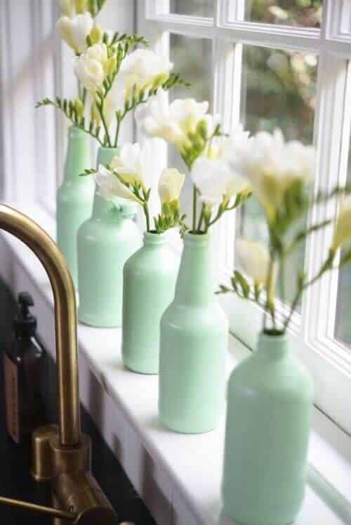 arreglos florales en botellas de vidrio 2