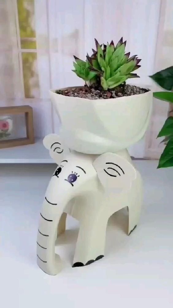 como hacer elefantes con envases bidones de plastico 3