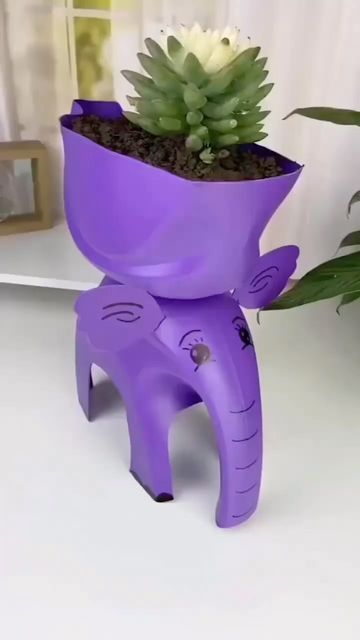 como hacer elefantes con envases bidones de plastico 5