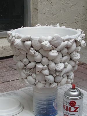 jarrones decorados con conchas marinas 6
